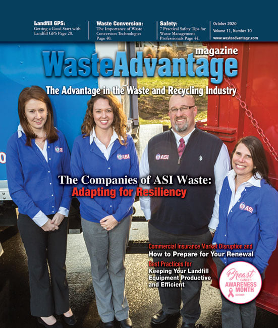 Magazine cover with the employees of ASMAI standing in front of trucks and dumpsters